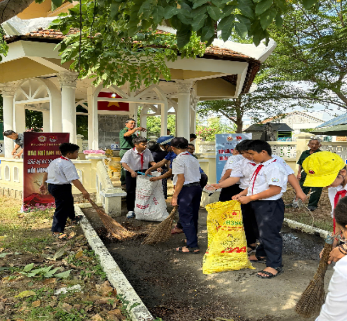 Các cháu vệ sinh nhà tưởng niệm